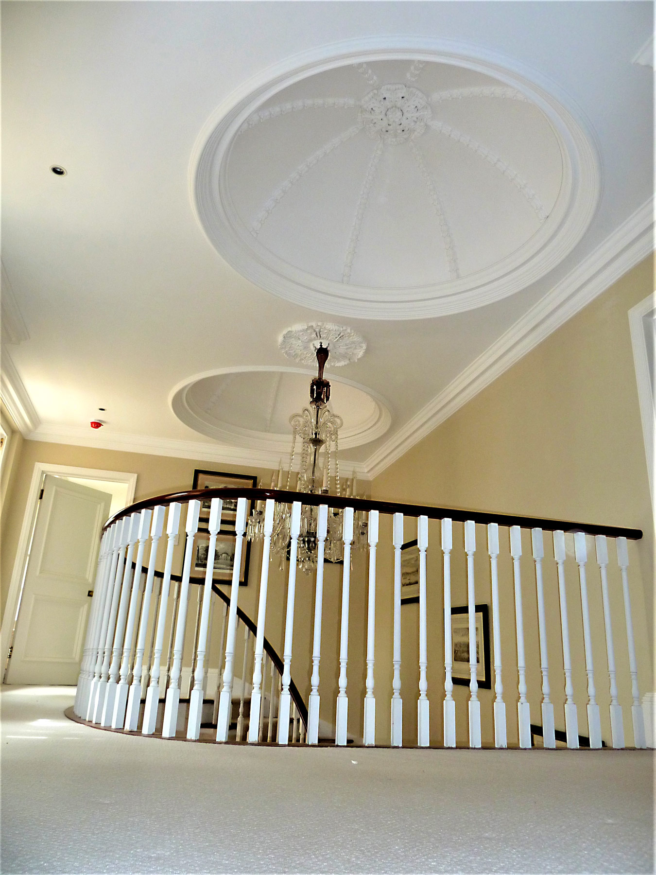  Stairwell with refurbished ceiling - Castle Eaton Construction, Surrey